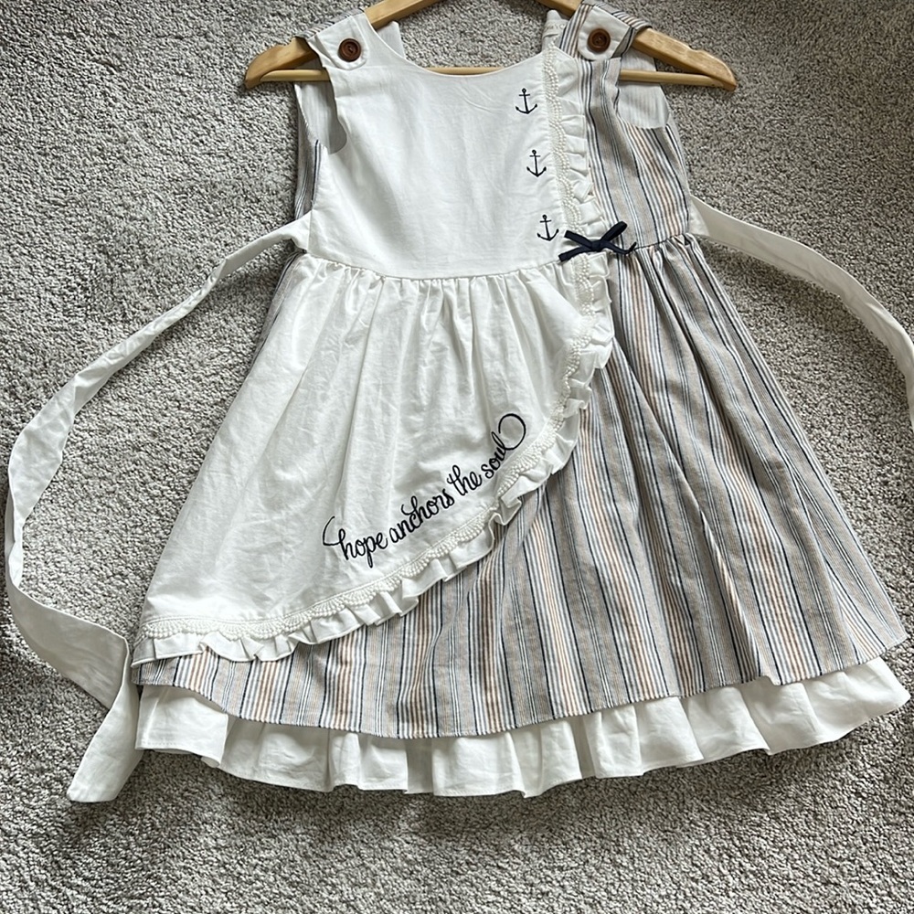 Evie’s closet. Size 7 dress.